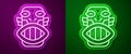 Glowing neon line Mexican mayan or aztec mask icon isolated on purple and green background. Vector