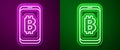 Glowing neon line Mining bitcoin from mobile icon isolated on purple and green background. Cryptocurrency mining