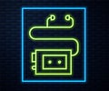 Glowing neon line Museum audio guide icon isolated on brick wall background. Headphones for excursions. Vector Royalty Free Stock Photo