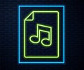 Glowing neon line Music book with note icon isolated on brick wall background. Music sheet with note stave. Notebook for Royalty Free Stock Photo