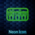 Glowing neon line Music synthesizer icon isolated on brick wall background. Electronic piano. Vector Royalty Free Stock Photo