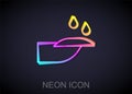 Glowing neon line Nail manicure icon isolated on black background. Vector