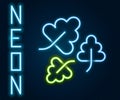 Glowing neon line Oak leaf icon isolated on black background. Colorful outline concept. Vector Royalty Free Stock Photo