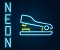 Glowing neon line Office stapler icon isolated on black background. Stapler, staple, paper, cardboard, office equipment