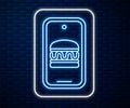 Glowing neon line Online ordering and fast food delivery icon isolated on brick wall background. Burger sign. Vector Royalty Free Stock Photo