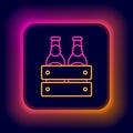Glowing neon line Pack of beer bottles icon isolated on black background. Wooden box and beer bottles. Case crate beer