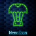Glowing neon line Parachute icon isolated on brick wall background. Vector
