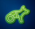 Glowing neon line Paralyzed dog in wheelchair icon isolated on blue background. Vector