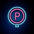 Glowing neon line Parking icon isolated on brick wall background. Street road sign. Colorful outline concept. Vector Royalty Free Stock Photo