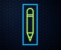 Glowing neon line Pencil with eraser icon isolated on brick wall background. Drawing and educational tools. School Royalty Free Stock Photo