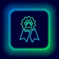 Glowing neon line Pet award symbol icon isolated on black background. Badge with dog or cat paw print and ribbons. Medal Royalty Free Stock Photo