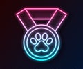 Glowing neon line Pet award symbol icon isolated on black background. Badge with dog or cat paw print and ribbons. Medal Royalty Free Stock Photo