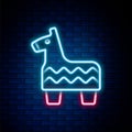 Glowing neon line Pinata icon isolated on brick wall background. Mexican traditional birthday toy. Colorful outline
