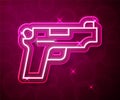 Glowing neon line Pistol or gun icon isolated on red background. Police or military handgun. Small firearm. Vector