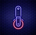 Glowing neon line Pizza knife icon isolated on brick wall background. Pizza cutter sign. Steel kitchenware equipment