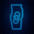 Glowing neon line Plaster on leg icon isolated on brick wall background. Vector