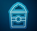 Glowing neon line Popcorn in cardboard box icon isolated on blue background. Popcorn bucket box. Vector Illustration Royalty Free Stock Photo