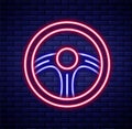 Glowing neon line Racing steering wheel icon isolated on brick wall background. Car wheel icon. Colorful outline concept Royalty Free Stock Photo