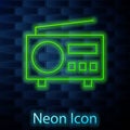 Glowing neon line Radio with antenna icon isolated on brick wall background. Vector Royalty Free Stock Photo