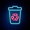 Glowing neon line Recycle bin with recycle symbol icon isolated on brick wall background. Trash can icon. Garbage bin