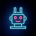 Glowing neon line Robot toy icon isolated on brick wall background. Colorful outline concept. Vector