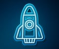 Glowing neon line Rocket ship icon isolated on blue background. Space travel. Vector Royalty Free Stock Photo