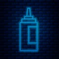 Glowing neon line Sauce bottle icon isolated on brick wall background. Ketchup, mustard and mayonnaise bottles with