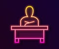Glowing neon line Schoolboy sitting at desk icon isolated on black background. Vector