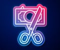 Glowing neon line Scissors cutting money icon isolated on blue background. Price, cost reduction or price reduction icon Royalty Free Stock Photo