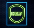 Glowing neon line Shield with text Help icon isolated on brick wall background. Guard sign. Security, safety, protection