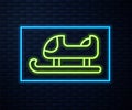 Glowing neon line Sled icon isolated on brick wall background. Winter mode of transport. Vector