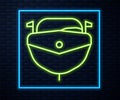 Glowing neon line Speedboat icon isolated on brick wall background. Vector Illustration