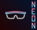 Glowing neon line Sport cycling sunglasses icon isolated on black background. Sport glasses icon. Colorful outline