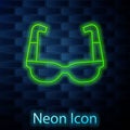 Glowing neon line Sport cycling sunglasses icon isolated on brick wall background. Sport glasses icon. Vector Royalty Free Stock Photo