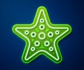 Glowing neon line Starfish icon isolated on blue background. Vector Royalty Free Stock Photo