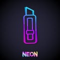 Glowing neon line Stationery knife icon isolated on black background. Office paper cutter. Vector