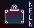 Glowing neon line Suitcase for travel icon isolated on black background. Traveling baggage sign. Travel luggage icon