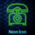 Glowing neon line Telephone icon isolated on brick wall background. Landline phone. Vector Illustration Royalty Free Stock Photo