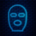 Glowing neon line Thief mask icon isolated on brick wall background. Bandit mask, criminal man. Vector Illustration Royalty Free Stock Photo