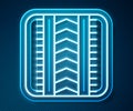 Glowing neon line Tire track icon isolated on blue background. Vector