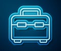 Glowing neon line Toolbox icon isolated on blue background. Tool box sign. Vector Illustration