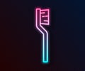 Glowing neon line Toothbrush icon isolated on black background. Vector