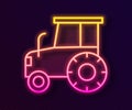 Glowing neon line Tractor icon isolated on black background. Vector