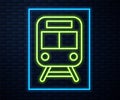 Glowing neon line Train and railway icon isolated on brick wall background. Public transportation symbol. Subway train Royalty Free Stock Photo