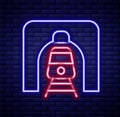 Glowing neon line Train in railway tunnel icon isolated on brick wall background. Railroad tunnel. Colorful outline Royalty Free Stock Photo