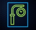 Glowing neon line Train station clock icon isolated on brick wall background. Vector Royalty Free Stock Photo