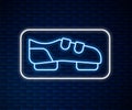 Glowing neon line Triathlon cycling shoes icon isolated on brick wall background. Sport shoes, bicycle shoes. Vector Royalty Free Stock Photo