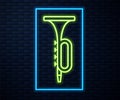 Glowing neon line Trumpet icon isolated on brick wall background. Musical instrument. Vector