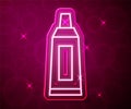 Glowing neon line Tube with paint palette icon isolated on red background. Vector