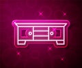 Glowing neon line TV table stand icon isolated on red background. Vector Royalty Free Stock Photo